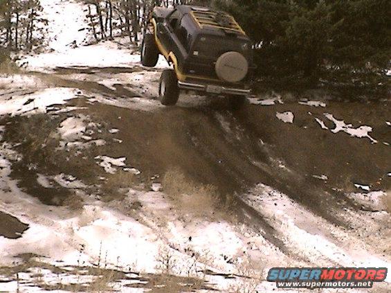 wheelinpic2.jpg One of my Buddies airing his Bronco II