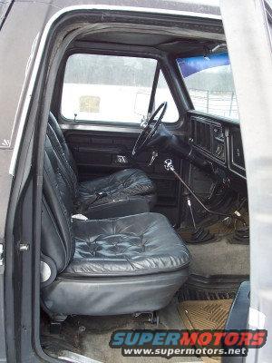 1978-ford-bronco-custom(interior).jpg This is the inside of my truck. The seats are supposedly power leather seats out of a 1989 LeBaron, but I have yet to find a pair like these in a LeBaron.