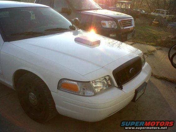 img2013111301103.jpg 2007 Crown Vic with a mock-up foam core for a carbon fiber hood scoopp