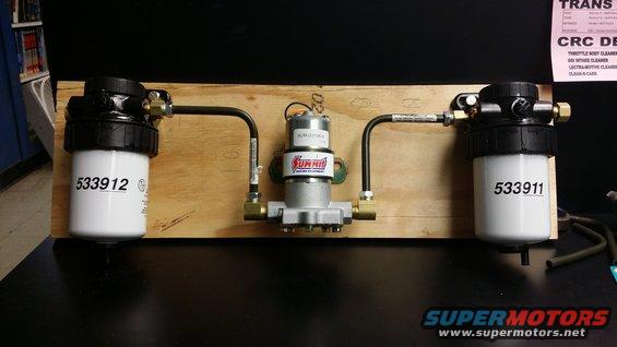 20141014_145409.jpg Final layout; nothing changed. 30 micron filter manager handing off to Summit fuel pump going into a 5 micron filter manager which then sends the fuel to the injection pump. Tubes are 3/8 as are all the fittings, in one form or other.