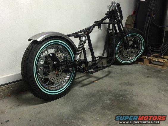 rear-view-of-fender-and-tokico-caliper-install.jpg Shovelhead swingarm frame with front/rear Tokico 6 piston calipers and solid mounted rear fender