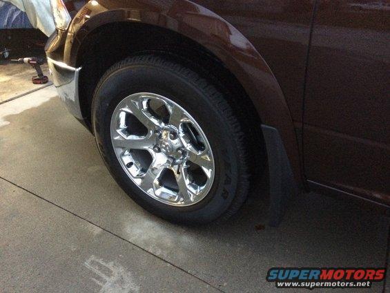 front-mopar-mudflap-installed.jpg 2015 Ram 1500 Ecodiesel Mopar Mud Flaps