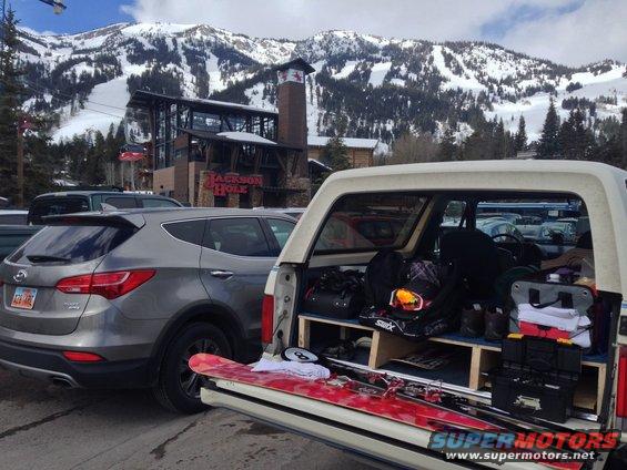 img_1454.jpg The cool thing about driving cross country is that your truck is your work bench.  Here changing bindings from one ski to another.  That and the cooler of beer in the truck!