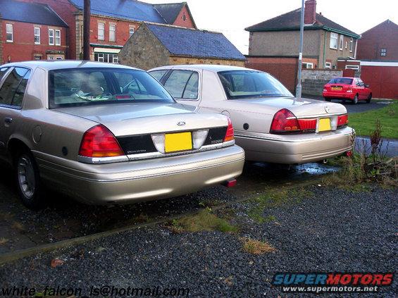 000_0093p.jpg Rear end view of both vehicles. 