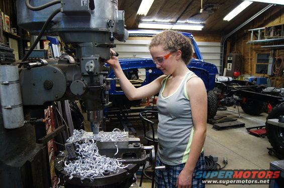 dsc02638.jpg Megan helping make the fuel pump mount,