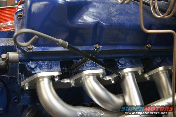 dsc08746.jpg Custom bent dipstick tube to fit with headers. what a job.