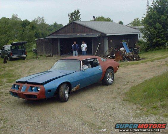 714_firebird.jpg Sitting in the next door neighbors yard getting ready for a fresh coat of paint