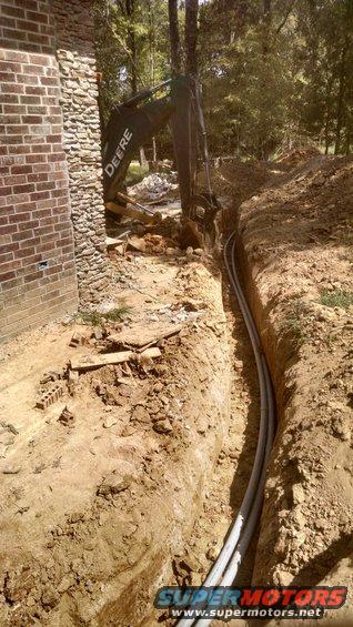 img_20160914_125404350_hdr.jpg On the 14th, the ditch was dug and the electricians connected the panels to the meter, but the house isn't powered yet.