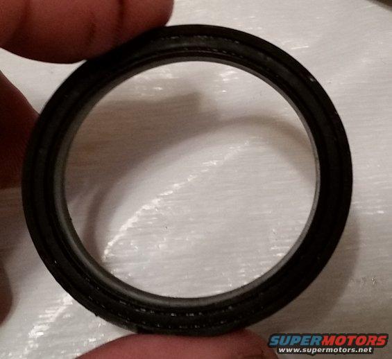 20170227_180521.jpg This is the piston seal.  The outer surface is supposed to provide a seal on the outer part of the housing, and the inner surface is supposed to provide a seal on the inner housing surface.  As fluid pressure builds up behind this seal (stepping on the clutch), the seal is forced out and consequently moves the rest of the assembly out.  The part with all the burrs on it rests on the flat surface on top.