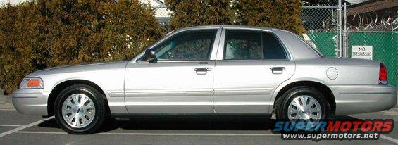 03-crown-vic-lx-left-side-copy.jpg My shiny almost new 2003 Ford Crown Victoria LX P74! Taken one day after purchase 03/13/04. Late model year production (06/03) so car has '04 paint code JP (Silver Birch Clearcoat Metallic) with Light Flint leather interior.