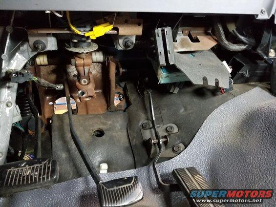 20180424_pedal3.jpg With both pushrods & the steering shaft pushed out of the firewall, the pedal box can come straight down.  Make sure the clutch & BOO switch wiring is out from between the pedal box & steering column support; then pull the clutch MC studs out of the firewall.