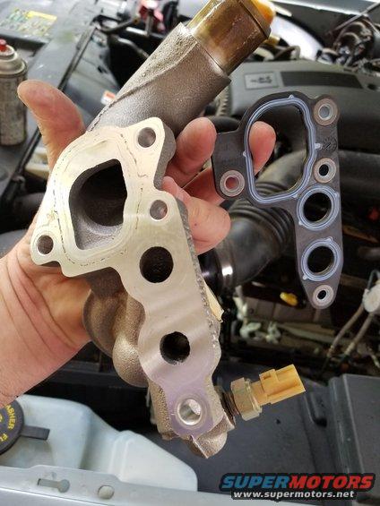 20180815_174815.jpg There was an oil leak near the front of the engine, which turned out to be the typical water outlet/filter base gasket.  I installed a new Ford F6AZ-6840-BA with some Indian Head shellac.