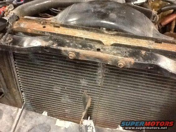 aa4c531ae60f4ff69edd24cff1717f6e.jpeg Original radiator. Poor previous repairs 