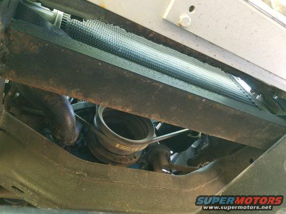 20190515_095103.jpg The radiator is mounted in a hot-rolled steel channel welded to the frame & lined with a thin rubber sheet.  The engine has surprisingly-few leaks, and the belts look recent.
