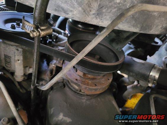 3engbelow.jpg The engine is surprisingly dry, but may be leaking around the oil pan gasket, or it could be blowing back from the ATF cooler hose.
IF THE IMAGE IS TOO SMALL, click it.

[url=https://www.supermotors.net/registry/media/1160760][img]https://www.supermotors.net/getfile/1160760/thumbnail/panrmsleak.jpg[/img][/url]