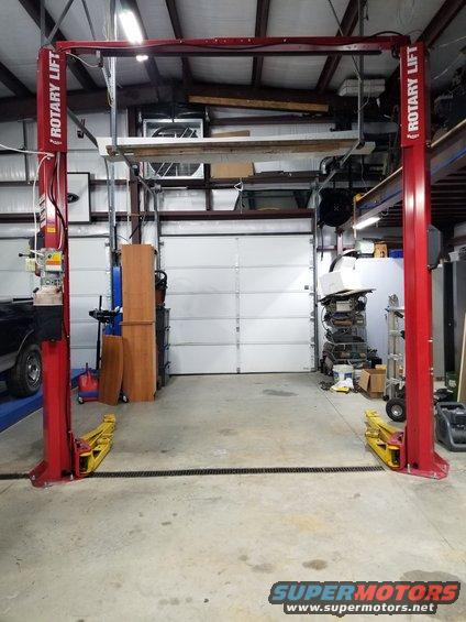 20190724_203405.jpg I had thought this couldn't happen for years, but it turned out to be easier & quicker than I expected to assemble, anchor, wire, & adjust the 2-post lift.