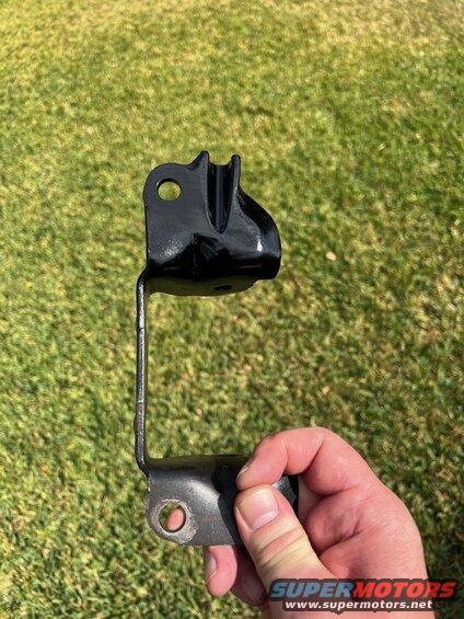 28-mount-mod.jpg Modified the drivers motor mount to have a channel to retain the clutch cable tight to the motor so it won't melt. 