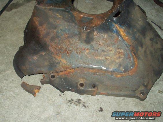 f250-9.jpg cracked bellhousing, some one tried to JB weld it together! LOL