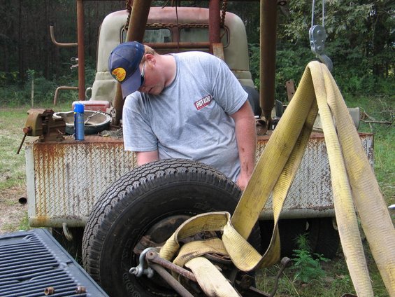 installing-tires.jpg putting tires on so it'd be easier to move around