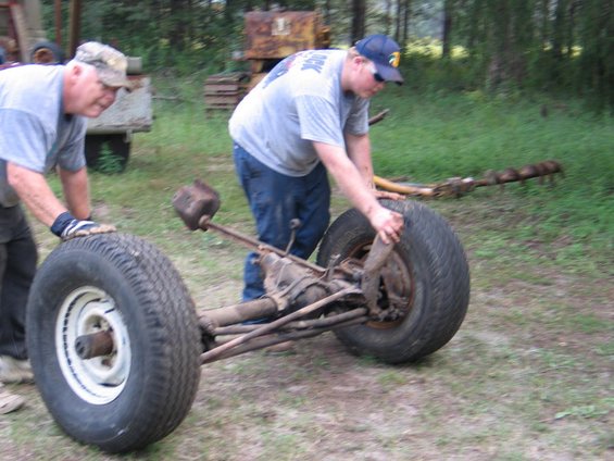 rolling-across-yard.jpg pops & I rolling it to the shop