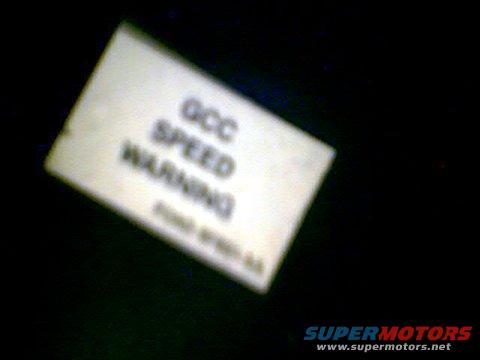 gcc-speed-warning-sticker--ps.jpg Closeup of Speed Warning Sticker in Glovebox