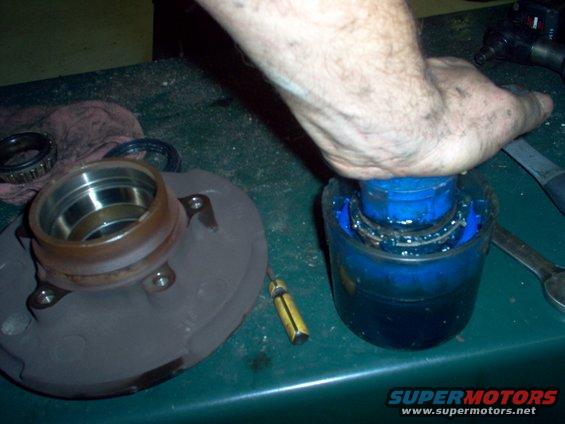 6-bearing-grease.jpg Repack the wheel bearings by whatever method you can.  This tool is reasonbly-priced on Amazon & eBay, and makes this job nearly clean.  Using needle-nose pliers to transfer the packed bearing from the tool to the hub significantly reduces cleanup time.