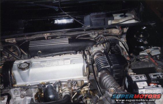 1986-glhs284-engine-bay.jpg Here is a picture of the engine bay before I had a new head gasket and a rare 89 CSX VNT Shelby valve cover installed