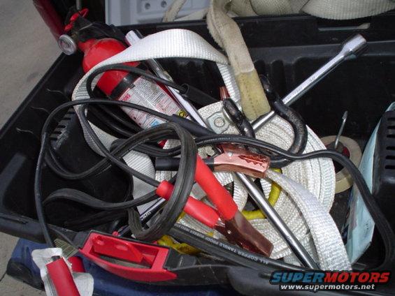 picture-171.jpg heres the box with the real recovery gear.  Jumper cables, tire iron, fire extingusher, 2 clevis', flashlight, and 2 30ft tow straps.  The second one has never been used.