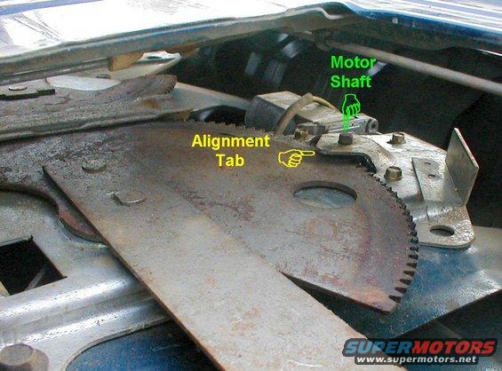 regulator.jpg The motor drive's shaft aligns thru the hole in the top of the regulator. If the large gear is popping off the motor gear, bend the small tab down that overhangs the regulator gear to hold it flat against the regulator chassis.  Also, ensure that the motor is mounted properly to the back of the regulator.