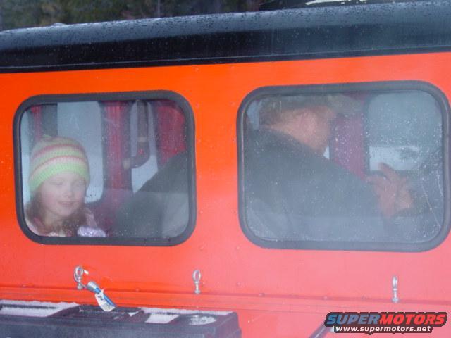 584da38c_62470.jpg hubby and kids going for a ride in the snowcat - since we helped them out.