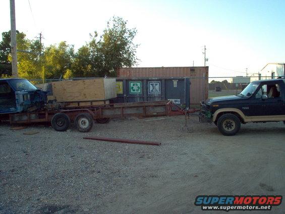 haul-tub-2.jpg It's barely supported by 2 jack stands in back, & a broken scissor jack in front.  When I start pulling with the winch, all 3 will fall over, dumping the body onto the 2 long channels, that will help it slide up onto the trailer.