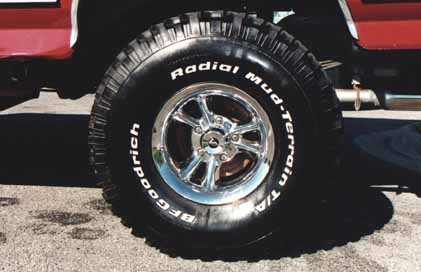 rim_and_tire.jpg 35" BFG mud terrains on chrome wishbone-style wheels