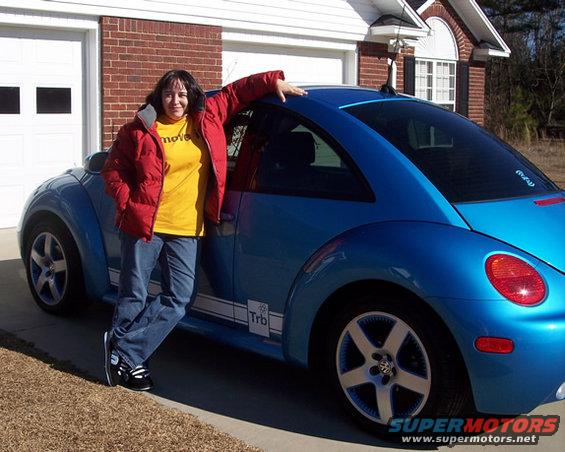 meandblue.jpg Me and my BABY!!!  See?  Even my shoes match my car ...