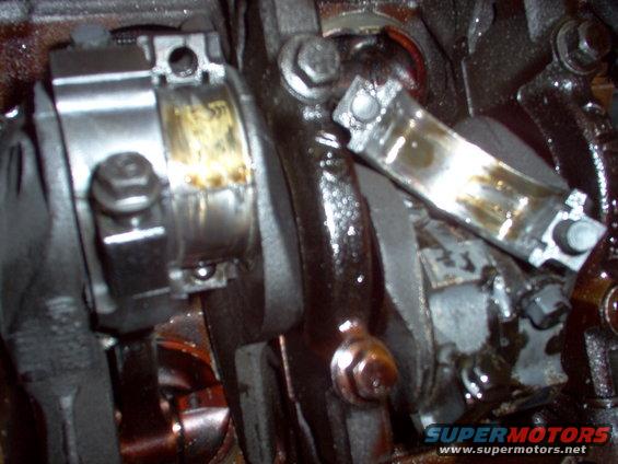 j10.jpg The 5 rod cap came off without its bearing, which I could see had spun (of course).