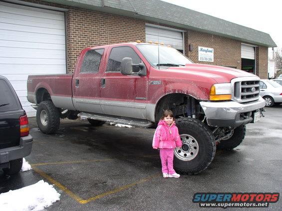 p1010228.jpg My daughter next to a buddys f-350 w/10 inches of lift