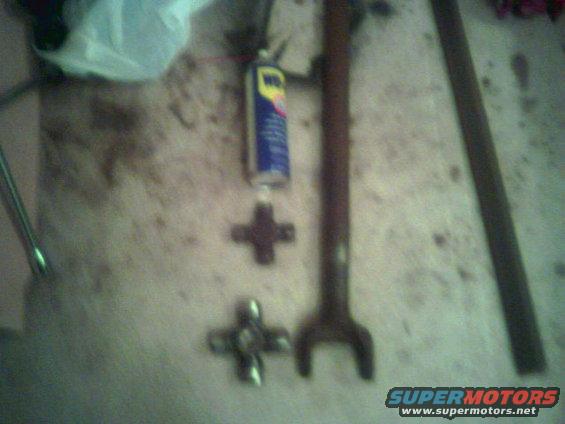 image019.jpg 35 spline dana 60 long side shaft with a new 1480? ujoint.  the smaller ujoint is a 1330 for size reference, and a can of wd40