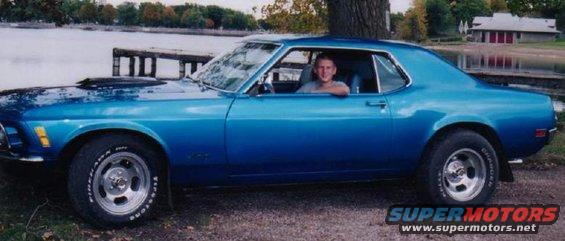 sitting-by-st.-james-lake.jpg This is actually one of senior pics from high school.  The background is St. James Lake.