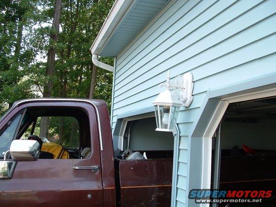 truck_at_new_house_61403_s.jpg how do you fit a truck in a garage that will not fit???