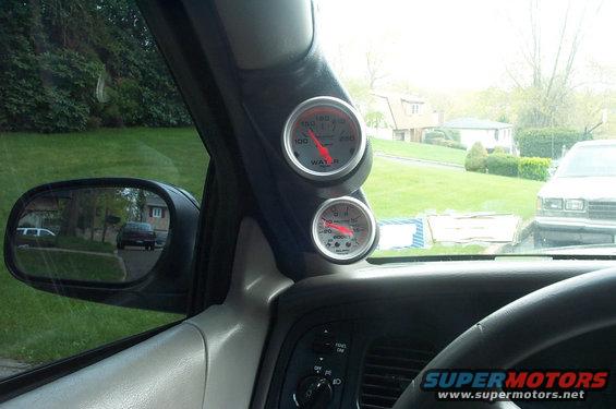 car-031.jpg Gauge pod and gauges. Temp gauge and Boost. Yea thats really for turbos or something that produces pressure but dont be fooled it has a vac reading on it so it is a useful gauge.