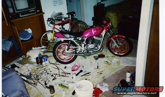 scan0316.jpg Dam! What a mess!  At left you can just see the USD Showa forks for the DR... another Big Project...