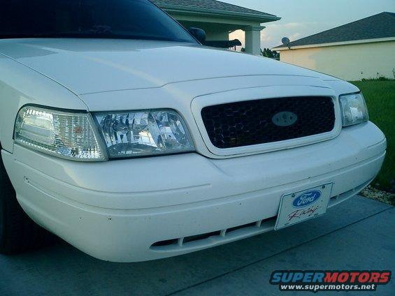 grille-006.jpg New honeycomb grille less Ford emblem at the moment, however painted surround white to match body.