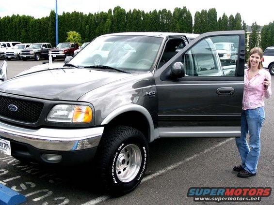 marysf150a.jpg My wife holding the keys to 'her truck' just prior to leaving the dealership, 11 Jun 05