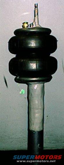 bagbeforepaint.jpg Custom made Air strut, shortened 3" yea, I shortened the strut 3", welded a bag on the charged it back up...