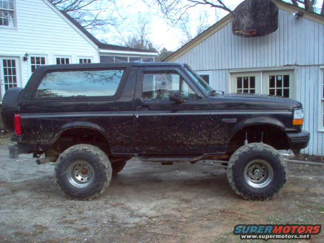 truck-025.jpg A LITTLE DIRTY BUT IT IS GETTING BIGGER THIS IS THE 3 BODY AND A 6 INCH STAGE 2 KIT FROM SKYJACKER WITH THE EXTENDED RADIUS ARMS, AND 35X15.50 SUPER SWAMPERS ON SOME 12 INCH WIDE UGLY STEEL WHEELS(THEY COME WITH THE TIRES IT WAS A GOOD DEAL BUT I HATE STEEL WHEELS) SHE'S GETTING BIG BUT A FEW MORE INCHES WILL DO!