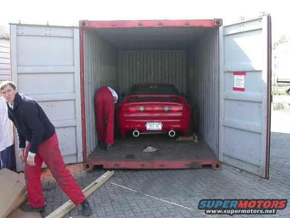 bremerhaven.jpg Some german guy preparing my car to be taken out of the container.