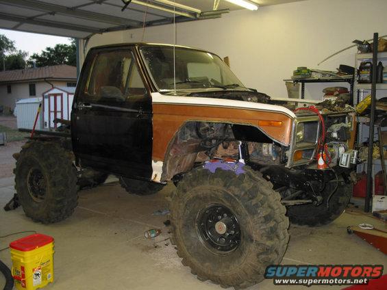 fendersbackon.jpg The front sheet metal back on the cab. The fenders are cut a LOT more than most, so new inner fenders need to be made.