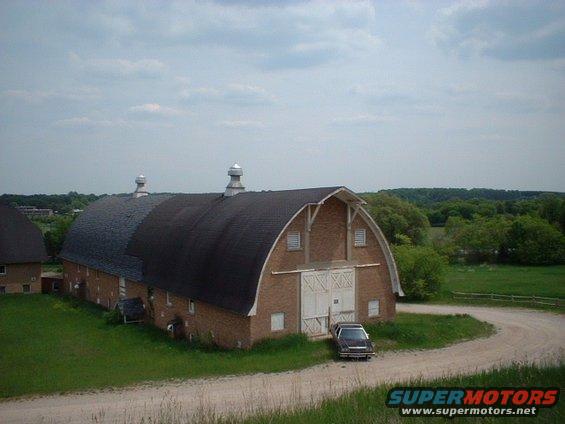 barnsth.jpg In front of one of the barns of the Traverse City State Hospital.  The barns were built just prior to the Depression.