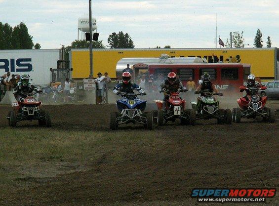 pict0029.jpg My slowest holeshot of the season (I'm rider #4) at 2005 Fansracing.com Race in Roseau, MN. Photo courtesy of Steeleracingphotos.com