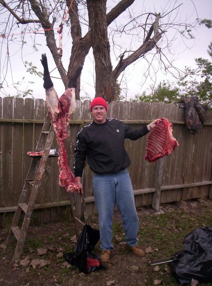 hogskinnin3.jpg Skinning a 200+lb Russion Boar