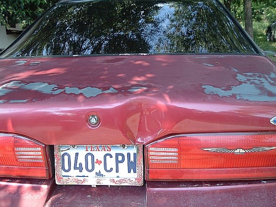 car-trouble-117.jpg this is the aftermath left in the wake of some idiot who backed into it at the supercenter crushing the trunk lid,